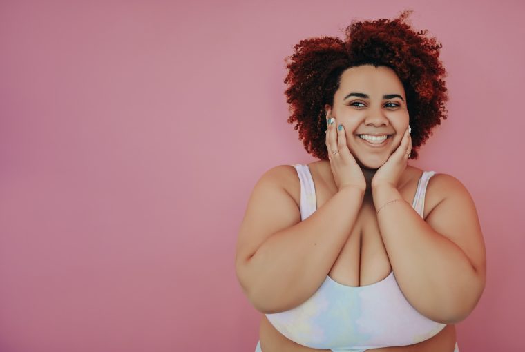 smiling plus size young woman
